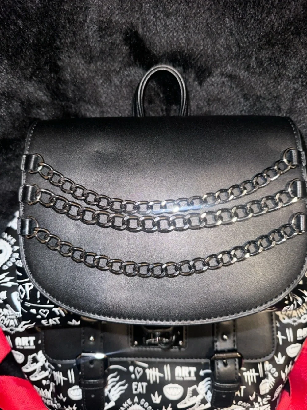 Cruella Deville Loungefly Black & White Graphic Mini Backpack with Chain Detail‎